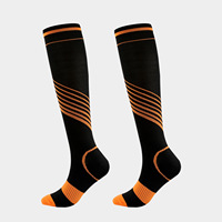 Bas de compression pour hommes et femmes. Pour le cyclisme et la course, avec un design élastique et extensible pour les mollets.