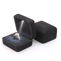 Boîtes de rangement pour bijoux en velours avec logo personnalisé OEM, bracelet lumineux noir, boucles d'oreilles, ensemble d'affichage LED, boîte cadeau pour bijoux