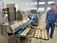 Machine de poche industrielle Gua Bao Bun faisant la nouvelle condition Lotus Leaf Clip Maker Burger chinois Fabrication de pain ciblée pour la farine