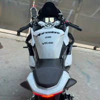 Moto sportive QJMOTOR Race 450 d'occasion, excellent état. Moteur bicylindre refroidi par liquide de 450 cm³, freins ABS et écran TFT.