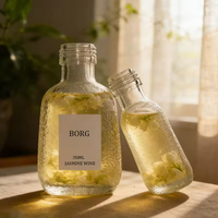 Bouteille d'eau en verre transparente givrée avec logo personnalisé, 250 ml, 350 ml, 500 ml, 750 ml, 800 ml, avec bouchon en plastique pour l'emballage des boissons