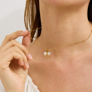 Collier nœud papillon en acier inoxydable plaqué or 18 carats avec pendentif zircon blanc, bijou cadeau - Product Image 4