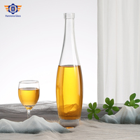 Bouteilles en verre élégantes à col long de 500 ml, personnalisées et luxueuses, pour spiritueux, bouteille unique en forme de larme pour whisky, vodka, avec bouchon