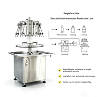 Ligne de production de remplisseuse rotative intégrée à 12 buses pour l'alcool, le whisky, la vodka, les jus et les spiritueux