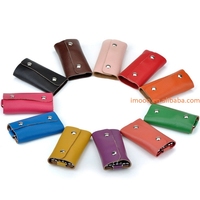 Precio de fábrica: Estuche de cuero para llaves de coche, funda organizadora con cadena, monedero, llavero, organizador de llaves de bolsillo