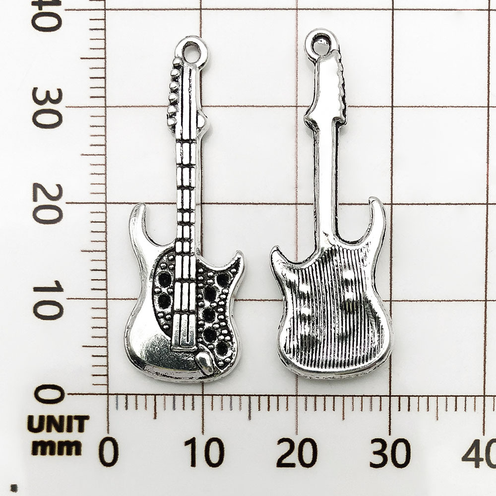 1 guitare musicale antique en argent - 2,8g - 12*38mm - 4841