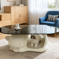 Table basse en FRP avec base creuse en forme de chat adorable et plateau en verre élégant alliant fonctionnalité et mignonnerie