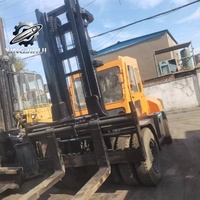 Chariot élévateur contrepoids moyen lourd FD100 TCM du Japon, fourches réglables, puissance diesel stable pour entrepôt et transport logistique