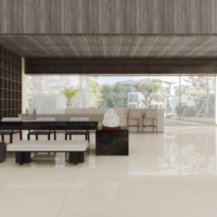 Des dalles de pierre frittée Sharon Amy Yellow de 900x1800 mm, revêtues d'un vernis, sont utilisées pour le mur de fond du projet.