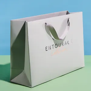 Aangepaste Logo Gedrukt Eco Wit Gecoat Papier Kleding Sieraden Verpakking Gift Boodschappentas