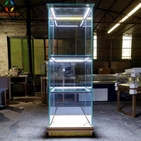 Vitrine en verre trempé avec éclairage LED personnalisé et base illuminée pour boutique de bijoux et centre commercial