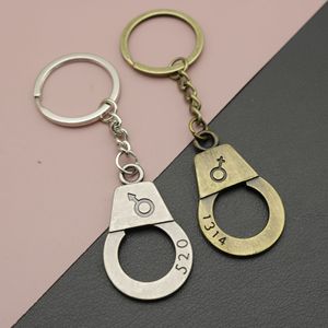 Llavero con Forma de <span class=keywords><strong>Esposas</strong></span> y Anillo Dividido de Aleación Plateada Antigua, para Parejas, Regalo de San Valentín - Product Image 1