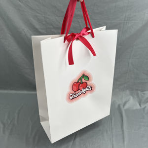 Premium White Paper Tote Bags with <b>Red</b> <b>Ribbon</b> Handles - Custom Branded Printed Packaging for Retail & Gifting - Product Image 2