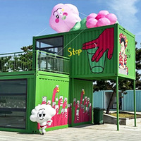 Magasin de détail modulaire en conteneur maritime, style Pop Art créatif, avec panneaux sandwich, graffitis muraux, structures gonflables et fenêtres en verre, pour café pop-up