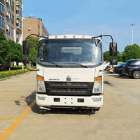 Camion arroseur Sinotruk Howo 7CBM avec canon à eau, moteur Weichai 140HP, fonction d'auto-amorçage, pour le lavage et l'irrigation des routes