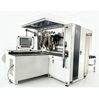 Machine de perçage CNC six faces pour le travail du bois, avec une vitesse de 18000 tr/min et 380 V, capable de contenir jusqu'à 5 unités dans un conteneur