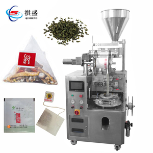 Machine d'emballage triangulaire automatique de sachets de thé Machine d'emballage de remplissage de sacs en nylon triangulaire avec ligne - Product Image 1