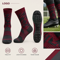 Chaussettes de football à grip jacquard, profil mince, ajustement parfait, avec tableau de tailles, semelle renforcée, motif équipe rouge et noir, pour une adhérence sécurisée sur le terrain