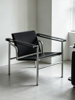 Fauteuil Baskulan personnalisable, style Bauhaus vintage, en cuir de vachette et tubes en acier, pour un usage domestique
