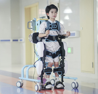Exosquelette robotique pour la rééducation de la démarche Entraînement des membres inférieurs Marcheur Portable et permet la marche libre Exosquelette Robot