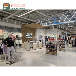 Customized Retail Outlet Brushed Stainless Steel Glass Showcase Installation Service Franchise Clothing Store - Product Image 4
