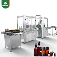 Machine de remplissage automatique de flacons compte-gouttes en verre de 10 à 100 ml, personnalisée en usine, pour huiles essentielles