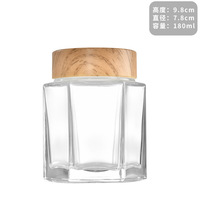 Prix de gros Bocal en verre hexagonal transparent haut de gamme de qualité alimentaire Bocaux en verre hexagonal de 180ml avec couvercles