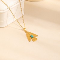 Nouveau collier pendentif en forme de cœur d'aigle en turquoise plaqué or en acier inoxydable