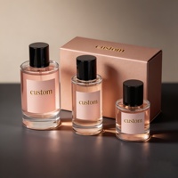 Flacon de parfum en verre rond court rose clair avec bouchon noir, coffret cadeau de luxe rose doré personnalisé, kit d'emballage vide pour parfum féminin