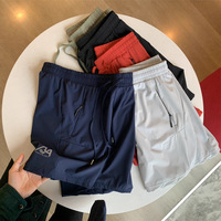 Shorts de course d'été en nylon pour hommes, imperméables, à séchage rapide, avec fermeture éclair, shorts de sport élastiques rafraîchissants pour la gym et le fitness