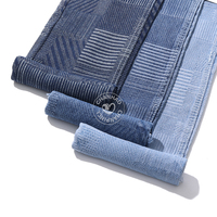 Tissu en denim jacquard bleu à motif zèbre 80% coton pour jeans 10,5 oz Tissu en denim de haute qualité en gros