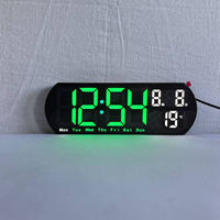 Beleuchtete Digitale LED-Tischuhr mit Nachtlicht, Kalender und Temperaturanzeige im Modernen Design aus Kunststoff