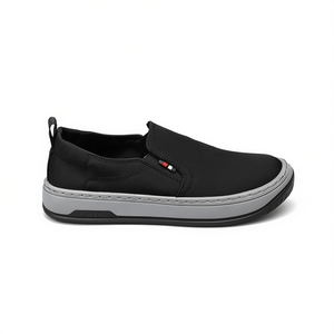 Chaussures décontractées à enfiler pour homme Tommy Hilfiger, noires, bout rond, dessus en tissu respirant, semelle en caoutchouc, tendance mode toutes saisons - Product Image 1
