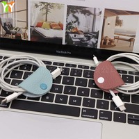 Mini enrouleur de câbles en cuir PU de forme ovale, organisateur de cordons couleur macaron, attache-câbles réutilisable pour la maison et les voyages quotidiens (vente en gros)