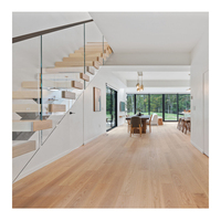 Escalier flottant droit moderne en acier inoxydable de haute qualité et durable avec marches en bois, monopoutre et garde-corps en verre pour hall et sous-sol