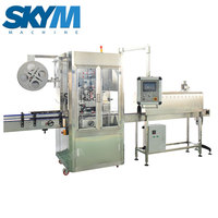 Machine d'étiquetage automatique à manchon rétractable SKYM pour bouteilles d'eau minérale et de boissons