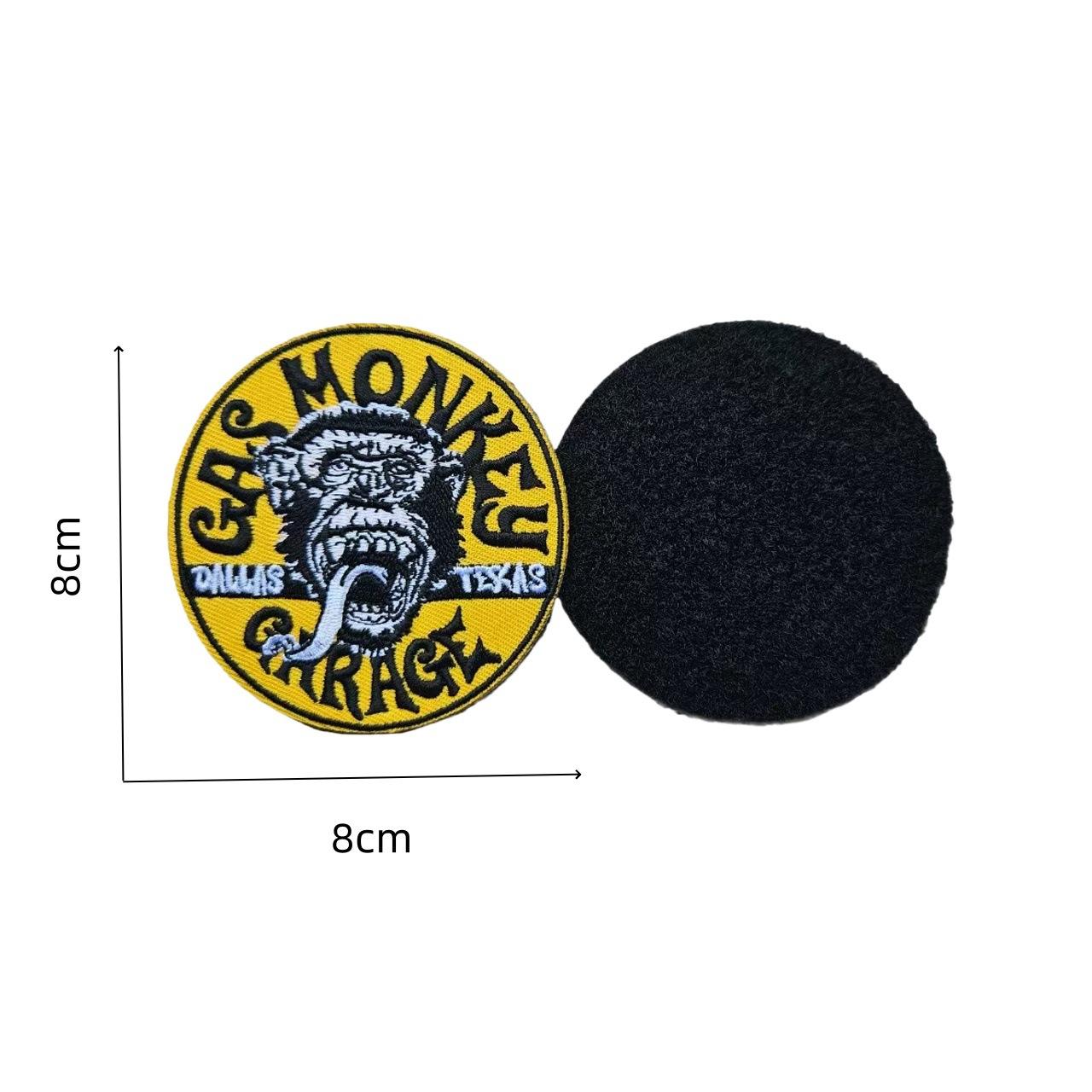 Emblème de moto avec fond jaune et lettres noires