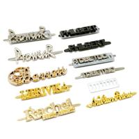 Étiquette en métal personnalisée avec logo Etiquette en métal gravée de marque de vêtement Etiquette en métal plaqué or pour maillot de bain vêtements avec logo pour pull
