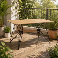 Table à manger rectangulaire industrielle en MDF avec plateau noir et pieds géométriques en fer, idéale pour balcon, patio, maison et jardin.