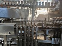 Machine automatique de remplissage et de scellage d'ampoules, machine de scellage par tirage pour ampoules en verre