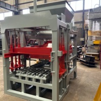 Machine à fabriquer des blocs de ciment hydraulique automatique QT4-15, faible taux de défaillance, production continue pour usine de briques commerciale