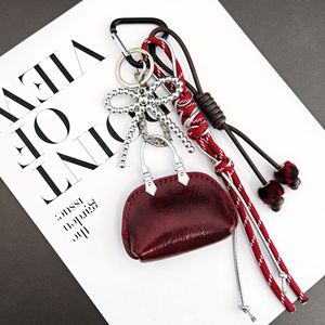 Goreal <span class=keywords><strong>2025</strong></span> New Arrival Phụ nữ túi quyến rũ Dark Red Luxury maximalist Bow <span class=keywords><strong>Keychain</strong></span> kim loại đính cườm bện dây thừng quyến rũ cho túi - Product Image 3