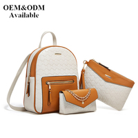 Nouvel ensemble de sacs à dos trois pièces rétro pour femme, style coréen 2026, en cuir souple/PU de couleur unie avec poche pour le voyage