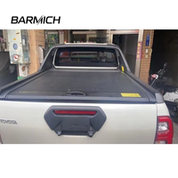 Couverture de benne rétractable manuelle durable en aluminium, étanche et antivol, compatible avec Toyota Hilux Revo Vigo Pickup