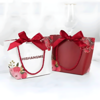 Petit sac d'emballage cadeau de luxe rouge personnalisé en papier avec nœud pour la Saint-Valentin, le mariage et Noël pour les bougies et l'artisanat