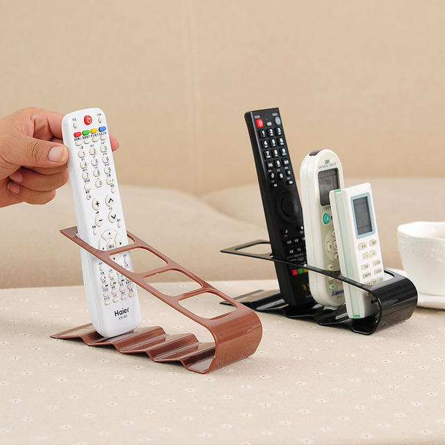 Four-Compartment Modern Plastic Remote Control Storage Rack with Dinnerware Holder Sustainable Multifunction Design