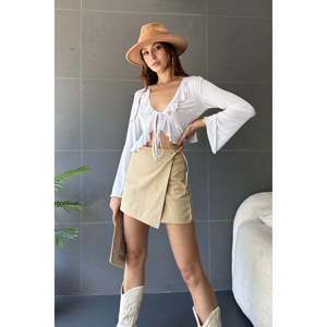 Elegante Falda con Solapa Delantera para Mujer, Cintura Regular, Algodón y Bambú Tejido, Ajuste Ajustable, Falda Moderna - Product Image 1