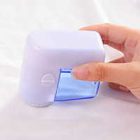 Mini batterie modèle vêtements rasage épilateur boule de poils tondeuse