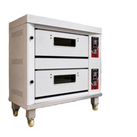 Four de cuisine professionnel avec un corps en acier inoxydable, adapté à un usage commercial dans les petites boulangeries.