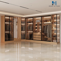 Système de dressing modulaire moderne avec éclairage LED, vitrine en verre, armoire de chambre personnalisée